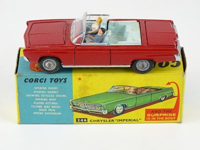 Lot 10 - A CORGI 246 Chrysler Imperial in red with pale...