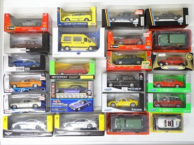 Lot 104 - A quantity of 1:24 scale diecast vehicles by...