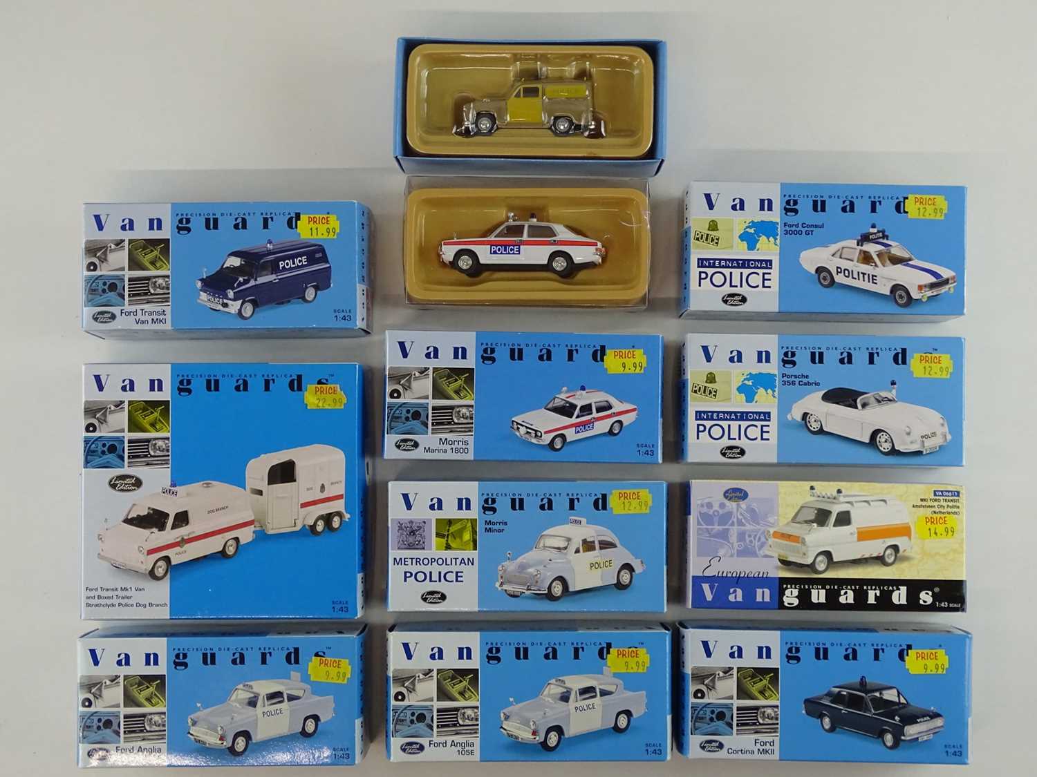 Lot 112 - A group of 1:43 scale diecast cars and vans...