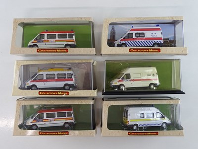 Lot 114 - A group of diecast police transit vans by...