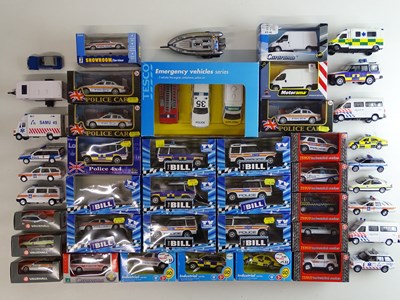 Lot 122 - A large quantity of diecast police vehicles by...