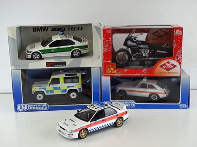 Lot 127 - A mixed group of 1:10 and 1:18 scale police...