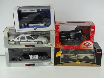 Lot 128 - A mixed group of 1:10 and 1:18 scale police...
