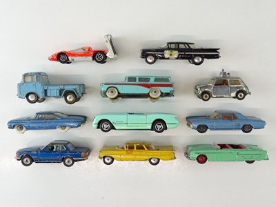 Lot 135 - A group of playworn diecast cars by CORGI,...