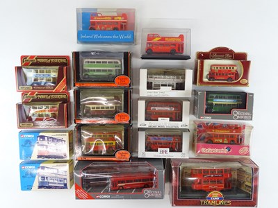 Lot 138 - A mixed group of diecast trams and buses by...