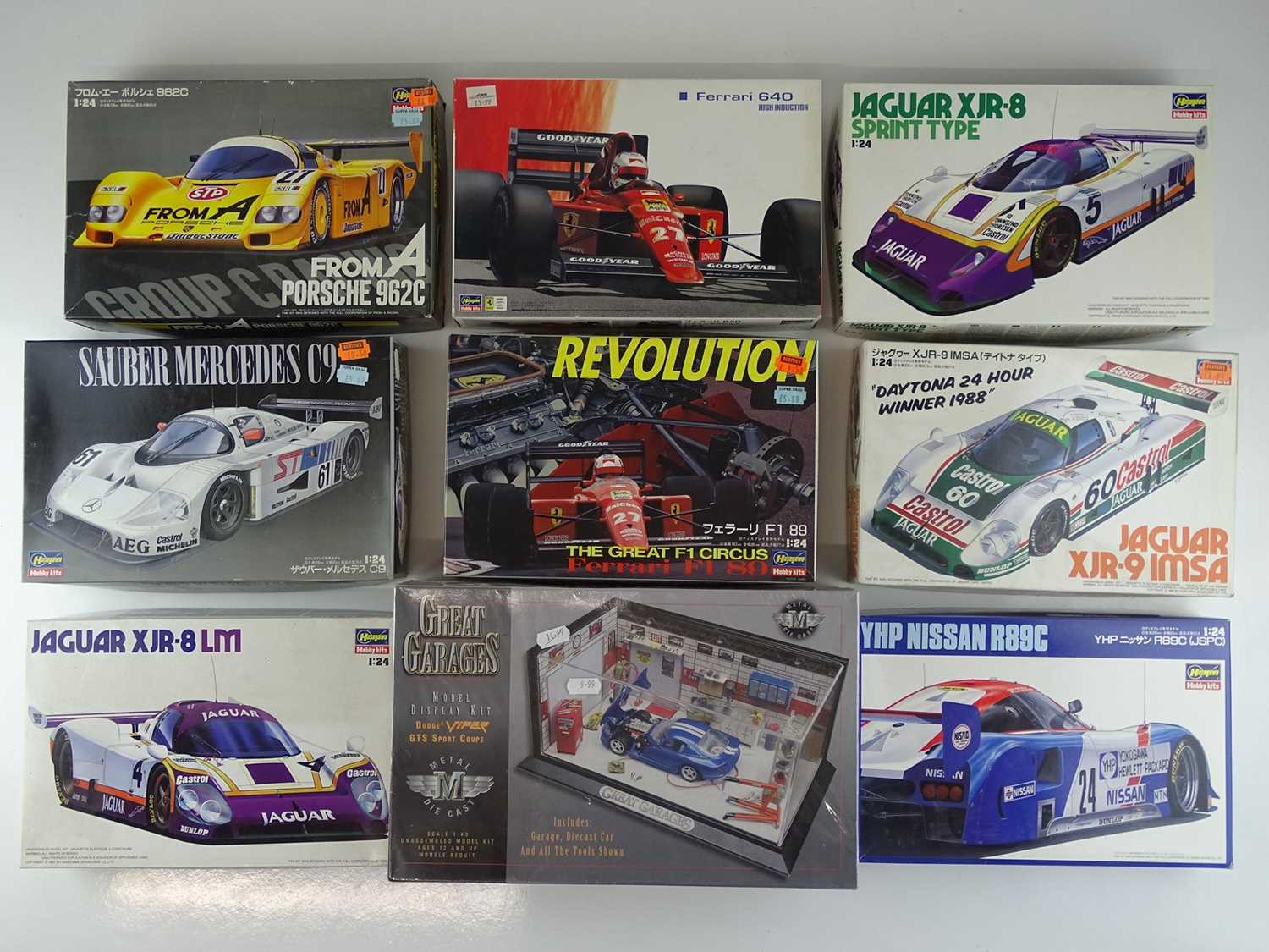 Lot 147 - A group of unbuilt 1:24 scale plastic car kits,...