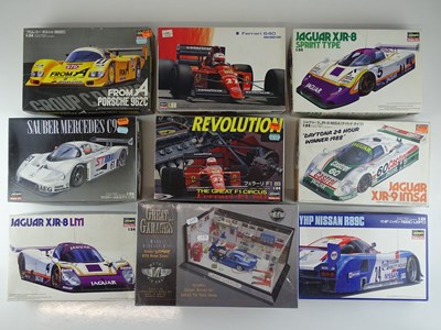 Lot 147 - A group of unbuilt 1:24 scale plastic car kits,...