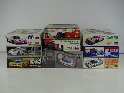 Lot 147 - A group of unbuilt 1:24 scale plastic car kits,...