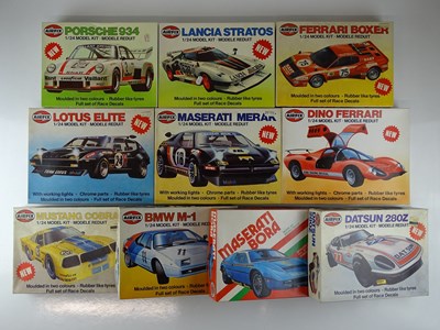 Lot 148 - A group of unbuilt 1:24 scale plastic car kits,...