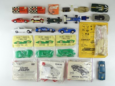 Lot 155 - A quantity of 1:32 scale slot racing cars,...