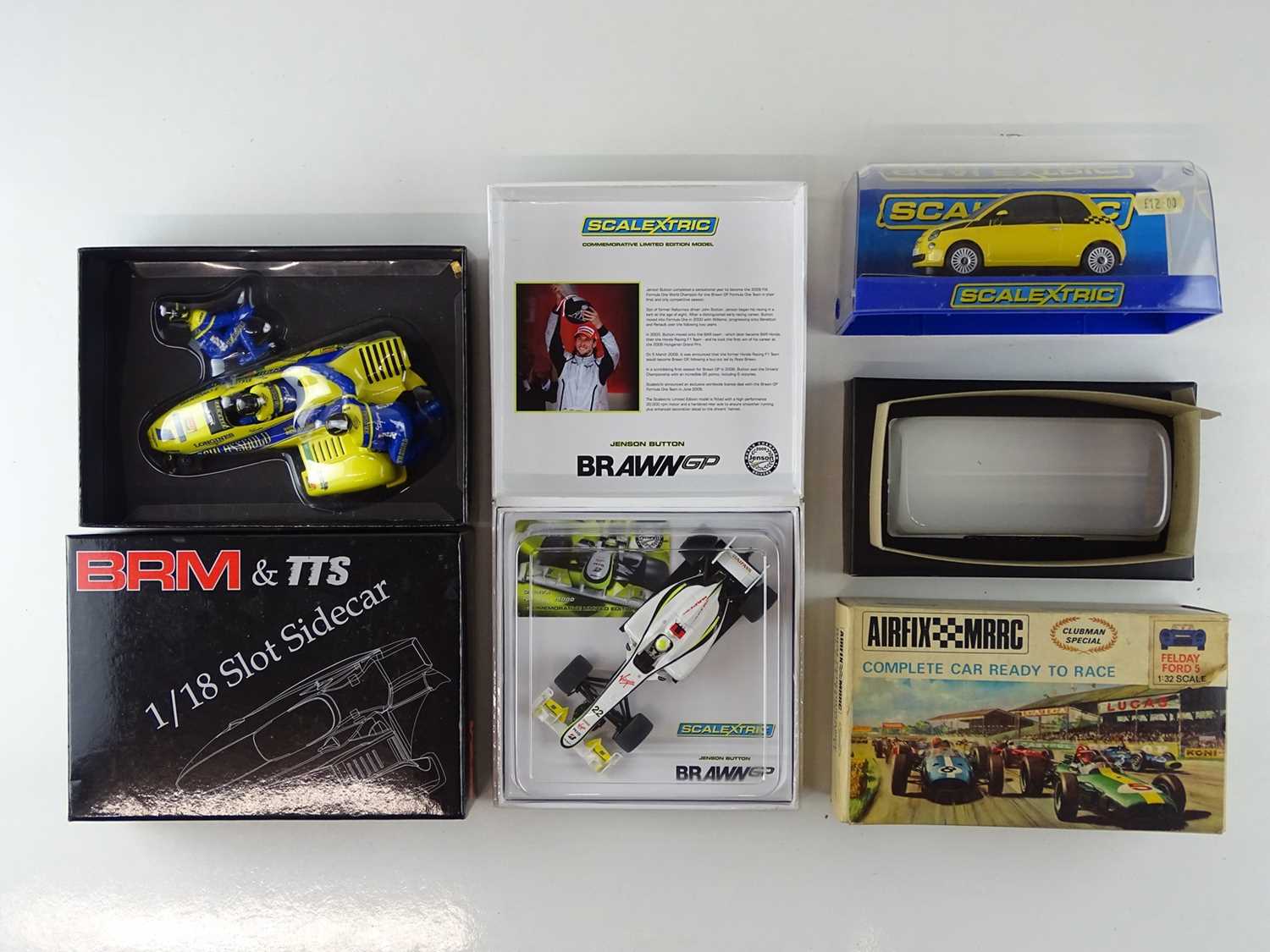 Lot 156 - A group of slot racing cars comprising a pair...