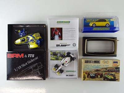 Lot 156 - A group of slot racing cars comprising a pair...