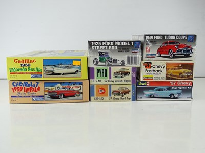Lot 157 - A group of unbuilt 1:32 scale plastic car kits,...