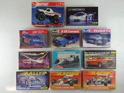 Lot 162 - A group of unbuilt 1:43 scale plastic car kits,...