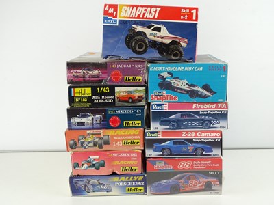 Lot 162 - A group of unbuilt 1:43 scale plastic car kits,...