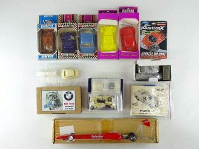 Lot 163 - A quantity of 1:32 scale slot racing cars...