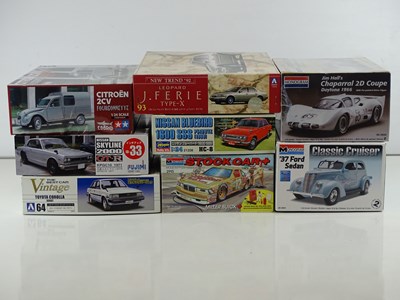 Lot 167 - A group of unbuilt 1:24 scale plastic car kits,...