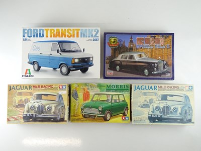 Lot 175 - A group of unbuilt 1:24 scale plastic car/van...