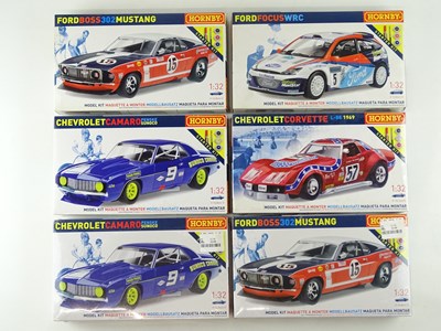 Lot 179 - A group of unbuilt 1:32 scale plastic car kits,...