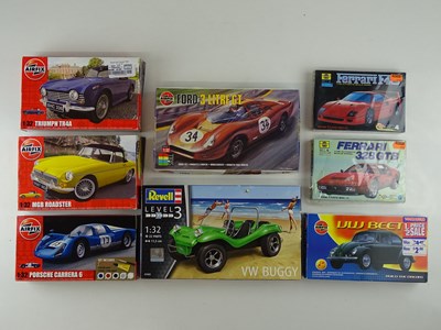 Lot 180 - A group of unbuilt 1:32 scale plastic car kits,...