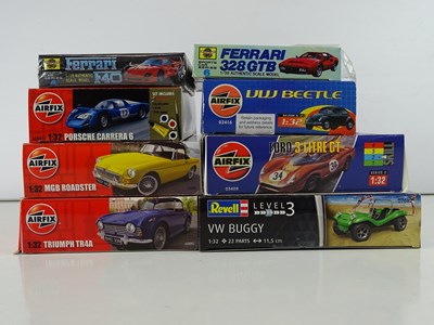 Lot 180 - A group of unbuilt 1:32 scale plastic car kits,...