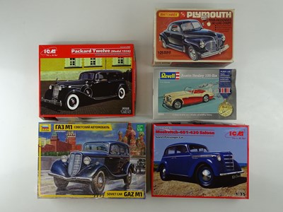 Lot 182 - A group of unbuilt 1:25/35 scale plastic car...