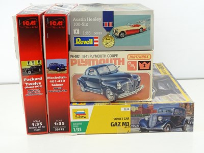 Lot 182 - A group of unbuilt 1:25/35 scale plastic car...