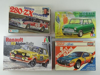 Lot 183 - A group of unbuilt 1:24 scale plastic car kits,...