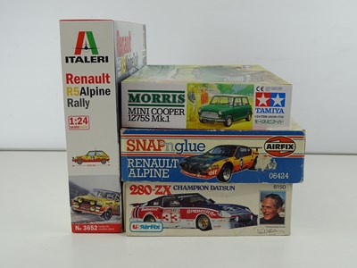 Lot 183 - A group of unbuilt 1:24 scale plastic car kits,...