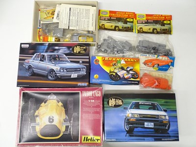 Lot 184 - A group of unbuilt 1:24 and 1:32 scale plastic...