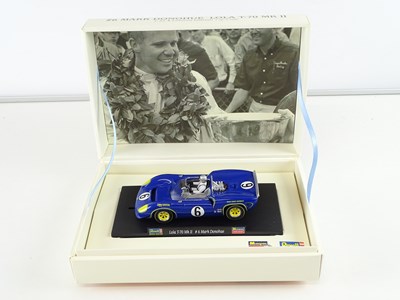 Lot 198 - A group of 1:32 scale slot racing cars by...