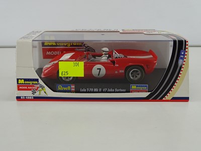 Lot 198 - A group of 1:32 scale slot racing cars by...