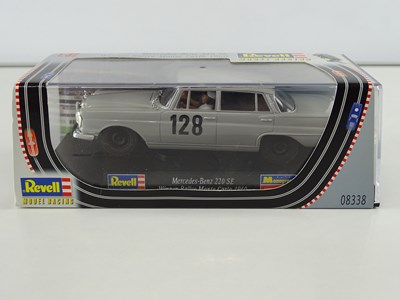 Lot 198 - A group of 1:32 scale slot racing cars by...