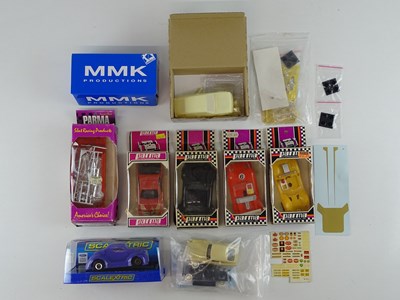 Lot 199 - A quantity of 1:32 scale slot racing cars,...