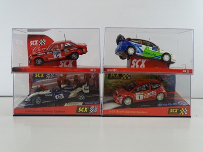 Lot 203 - A group of 1:32 scale slot racing cars by SCX...