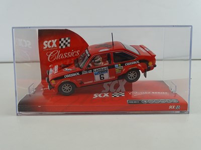 Lot 203 - A group of 1:32 scale slot racing cars by SCX...
