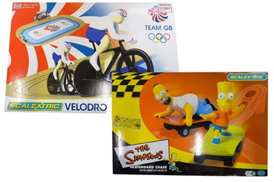 Lot 207 - A pair of MICRO SCALEXTRIC slot racing sets...