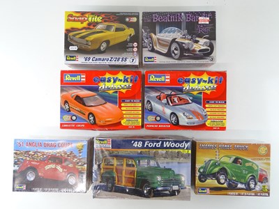 Lot 209 - A group of 1:25 scale plastic car kits by...