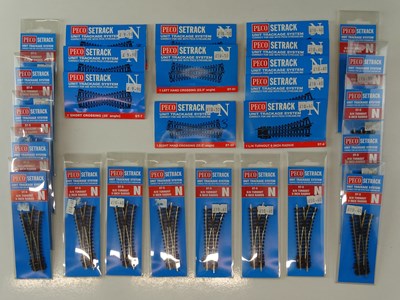 Lot 213 - A quantity of N Gauge PECO Setrack points and...