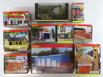 Lot 256 - A group of OO Gauge resin buildings by HORNBY...