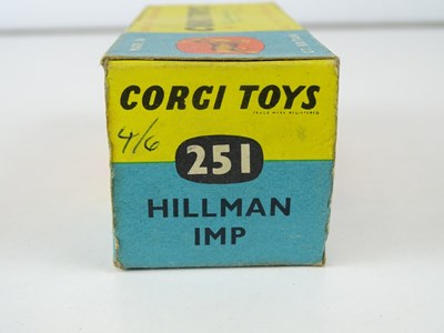 Lot 26 - A CORGI 251 Hillman Imp in metallic dark blue -...