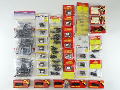 Lot 266 - A large group of OO Gauge point motors and...