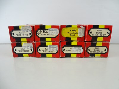 Lot 266 - A large group of OO Gauge point motors and...