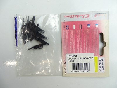 Lot 266 - A large group of OO Gauge point motors and...