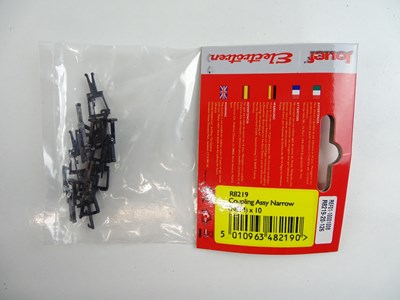 Lot 266 - A large group of OO Gauge point motors and...