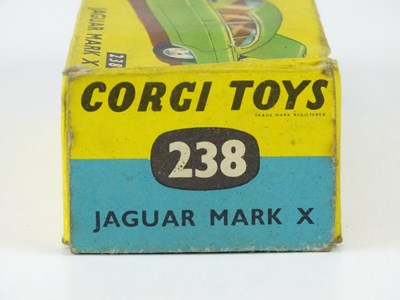 Lot 27 - A CORGI 238 Jaguar Mark X in metallic...