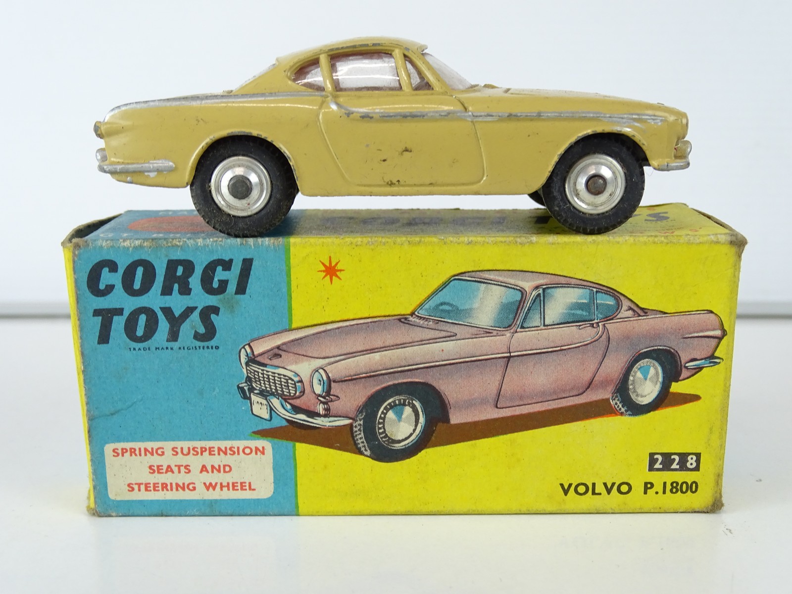 Lot 30 - A CORGI 228 Volvo P1800 in beige with red