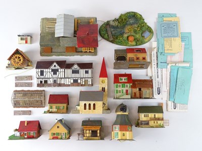 Lot 312 - A group of OO/HO gauge kit built buildings and...