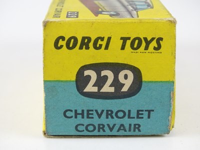 Lot 31 - A CORGI 229 Chevrolet Corvair in blue - F/G in...