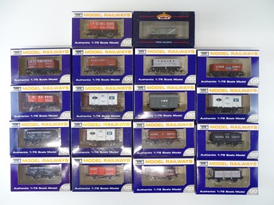 Lot 319 - A group of 4-wheel OO Gauge wagons by DAPOL &...